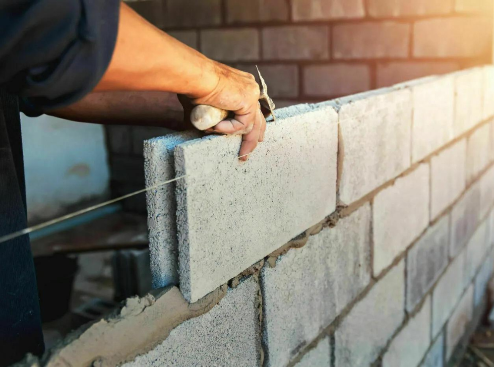 Murs traditionnels en briques ou parpaing
